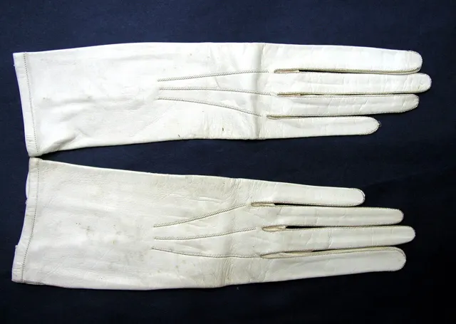 Pair of white women's gloves